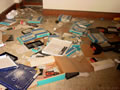 Church related videos and tapes strewn across the floor