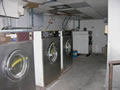 Basement laundry room washers.